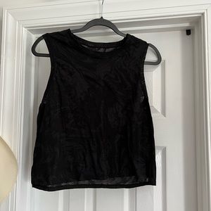 black medium length tank top